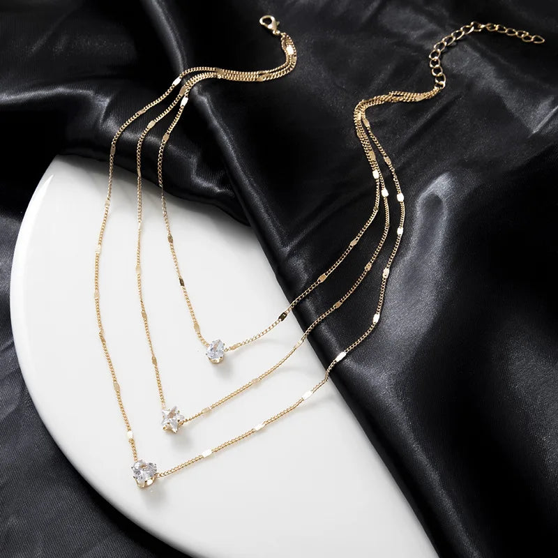 Collar Multicapa de Circonita – Cadena Dorada con Dije Brillante para Mujer